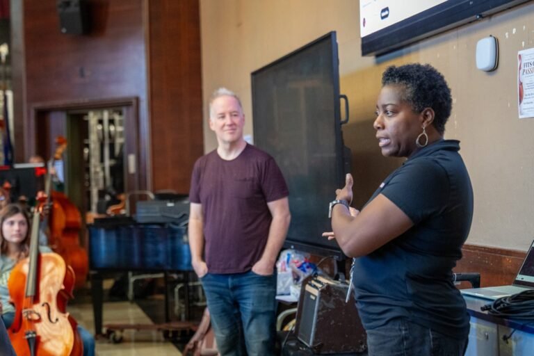 Christian Howes listening as a participant speaks during the McCaskey High School music workshop in Lancaster