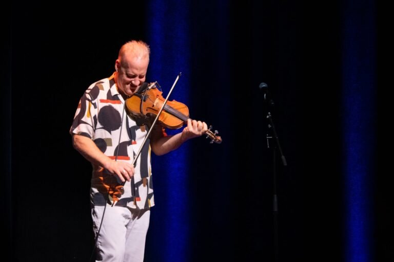 Christian Howes playing violin onstage at Presidio Theatre in San Francisco