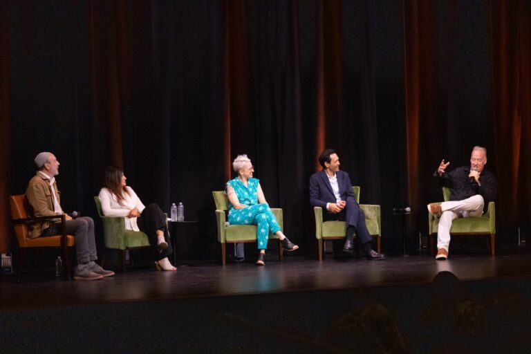 Five panelists seated onstage in conversation after Redemption Time at Presidio Theatre in San Francisco
